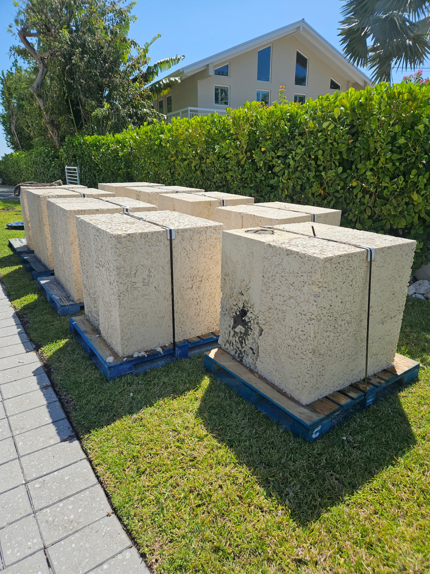 Stone banded on pallets ready for pickup
